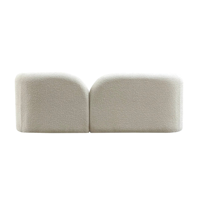 this media sofa, offering both comfort and style. Its contemporary design and refined silhouette, accentuated by a curved low back, effortlessly blend with any current home decor. Adorned in exquisite white boucle fabric, this two or three-seater sofa adds a touch of elegance to your living space, making it a versatile and chic piece for your media and entertainment area.