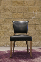 7. Luther Dining Chair - Black featuring a versatile and neutral color