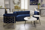 5. "Contemporary honeycomb chair in vibrant blue velvet"