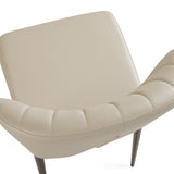 7. "Shell Dining Chair in Taupe Leatherette - Durable and easy to clean"