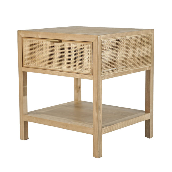 1. "Rattan side table in natural finish"