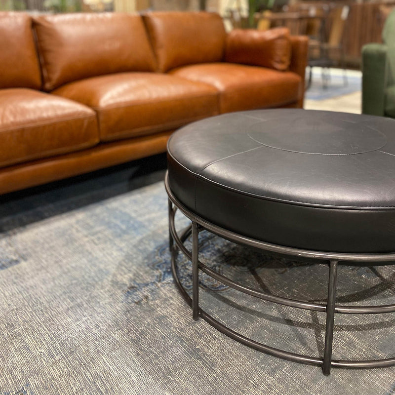 7. "Ziggy Ottoman with tufted detailing for a touch of sophistication"