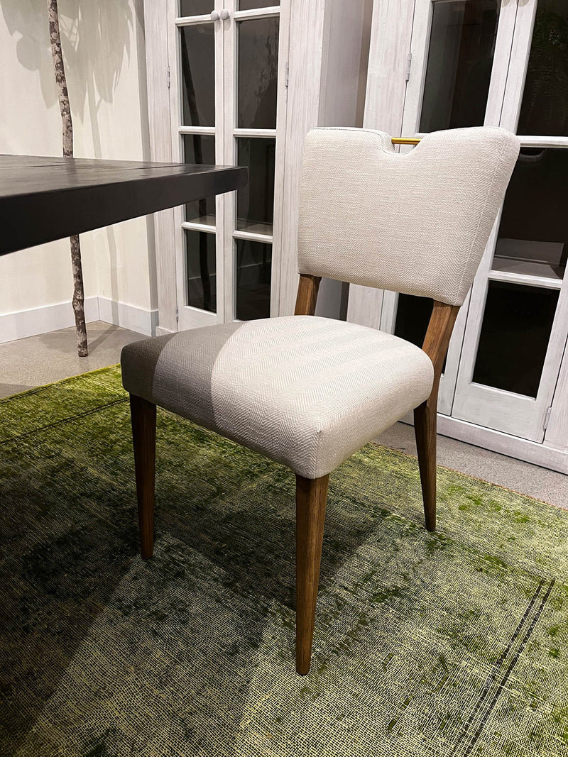 11. "Luella Dining Chair - Sandy Beige/Cool Brown Legs: Make a statement with this eye-catching and comfortable dining chair"