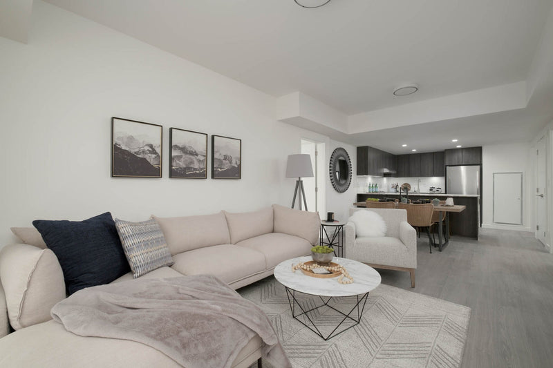 8. Valencia Round Coffee Table - White Marble/Black Matte with ample surface area for drinks and decor