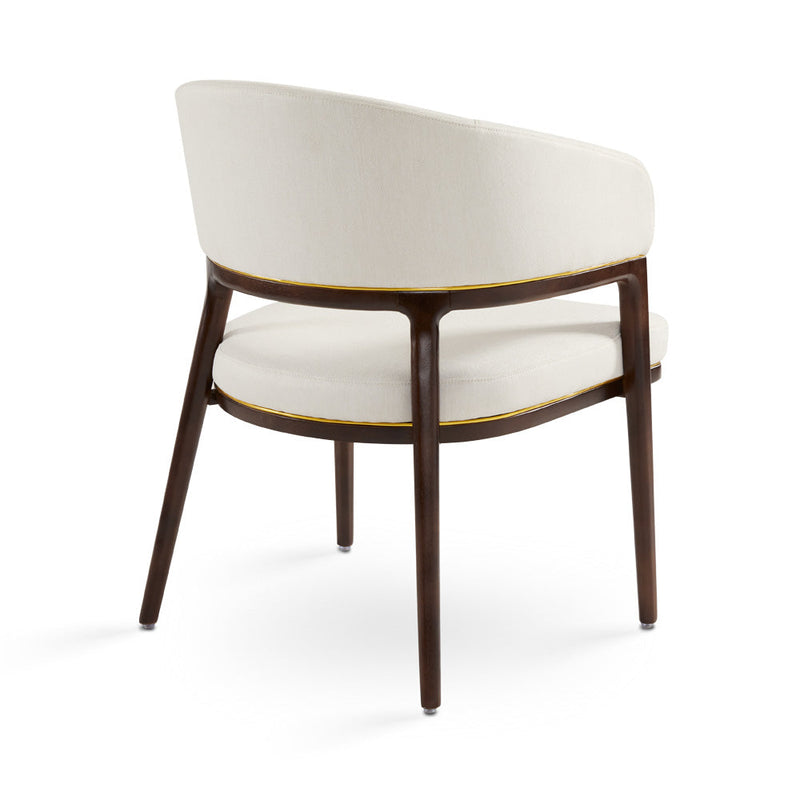 A fresh take on the traditional accent chair with soft ivory linen upholstered curves, Ash wood legs with walnut finish and  Polished gold trim
