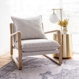 Elevate your home decor with the timeless appeal of the Finn Sling Chair in Taupe Boucle—an instant classic that effortlessly blends mid-mod-inspired design with iconic retro aesthetics. The exposed oak-colored wood frame and thick plush boucle cushions, designed for both fabulousness and coziness, bring unparalleled comfort and style to any space. Whether placed individually or in pairs, these chairs create a warm and inviting atmosphere in living rooms, bedrooms, or family rooms.