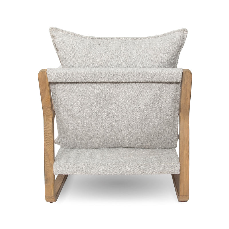 Elevate your home decor with the timeless appeal of the Finn Sling Chair in Taupe Boucle—an instant classic that effortlessly blends mid-mod-inspired design with iconic retro aesthetics. The exposed oak-colored wood frame and thick plush boucle cushions, designed for both fabulousness and coziness, bring unparalleled comfort and style to any space. Whether placed individually or in pairs, these chairs create a warm and inviting atmosphere in living rooms, bedrooms, or family rooms.